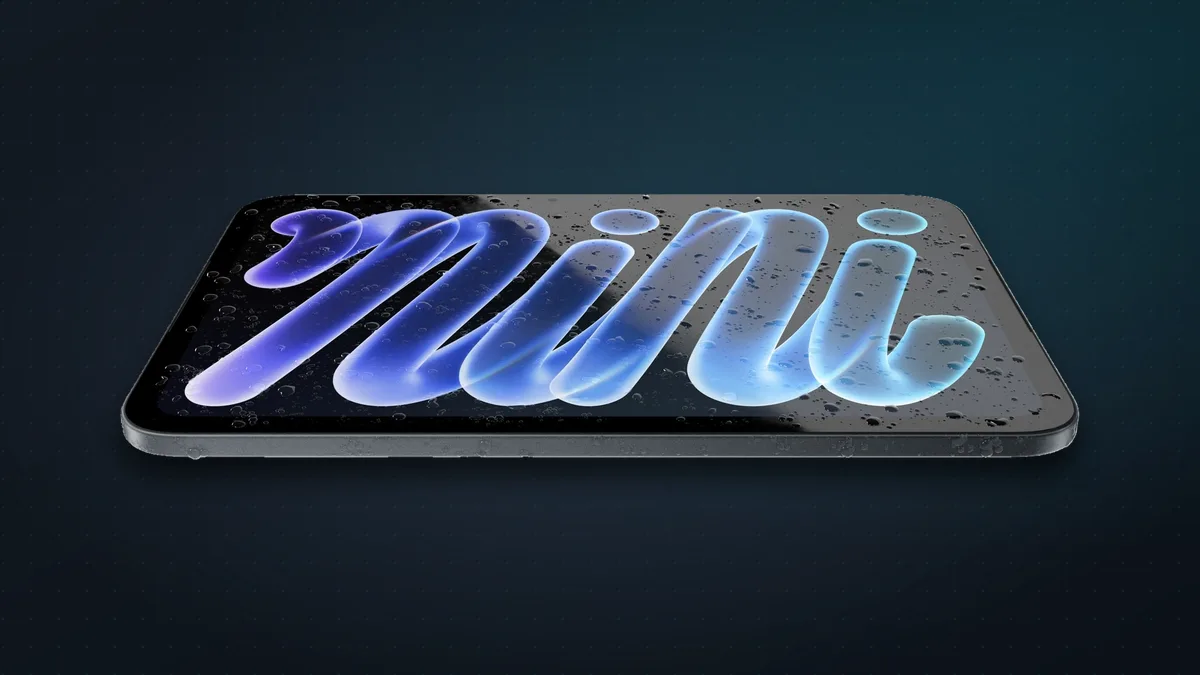 New iPad mini lying flat with water droplets on its OLED screen