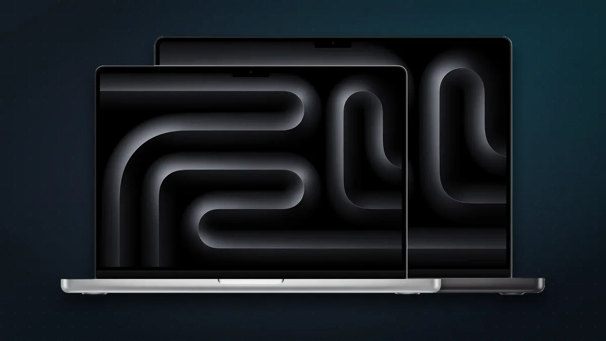 14-inch MacBook Pro in silver in front of a 16-inch in space black